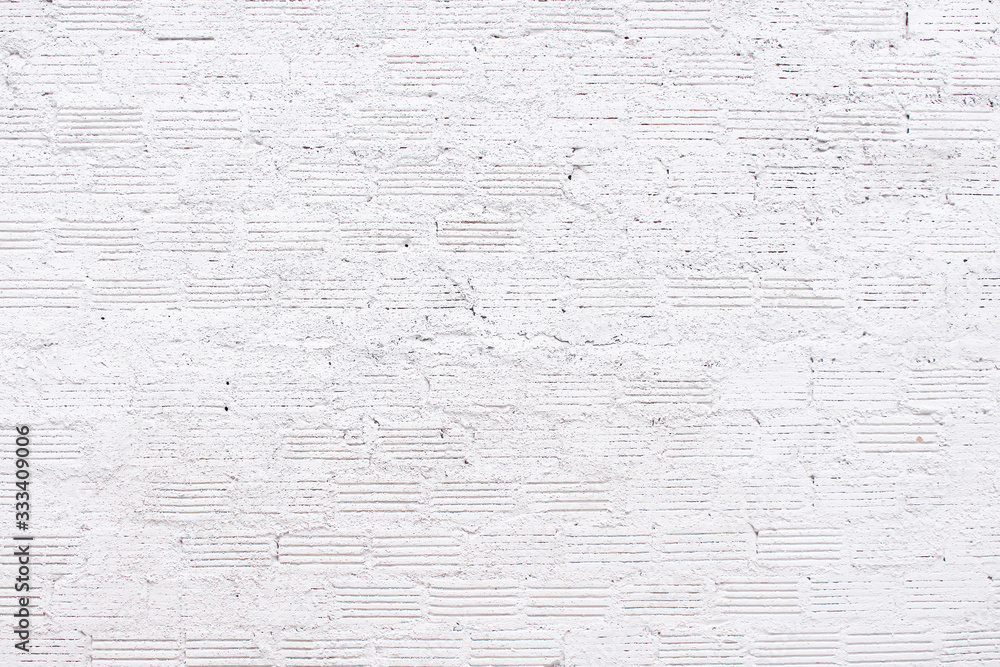 Grey white brick wall texture on background and copy space Grey white brick wall texture on background and copy space