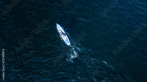 athlete kayaks on the river . Travel or kayaking concept. Drone shot, aerial view, picture with place for your text