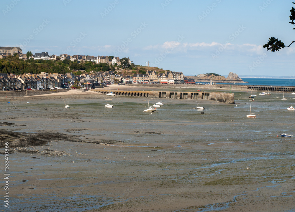 Boats on dry land at the beach at low tide in Cancale famous oysters production town, Brittany, France, Boats on dry land at the beach at low tide in Cancale famous oysters production town, Brittany, France,