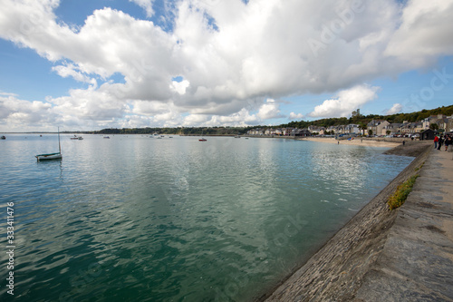 Wallpaper Mural  Fishing boats and yachts moored in the bay at high tide in Cancale, famous oysters production town. Brittany, France, Torontodigital.ca