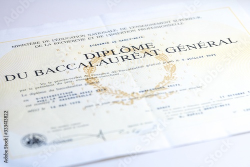Baccalaureate certificate on a wooden table in France