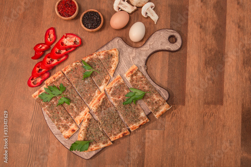 turkish pita on wooden board