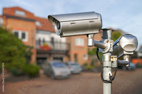 Security CCTV video camera monitoring home.