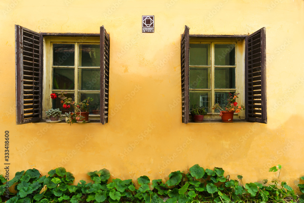 Traditional windows on the streets of the medieval city of Sighisoara