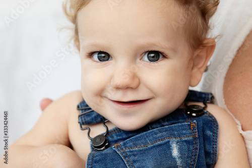 Close up portrait of cute smiling baby photo
