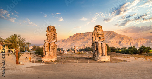 Colossi of Memnon at sunset photo