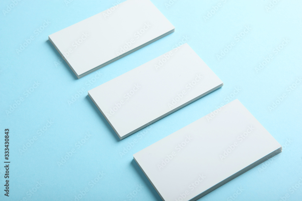 business cards on a colored background top view. Place to insert text business cards on a colored background top view. Place to insert text