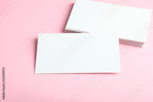 business cards on a colored background top view. Place to insert text