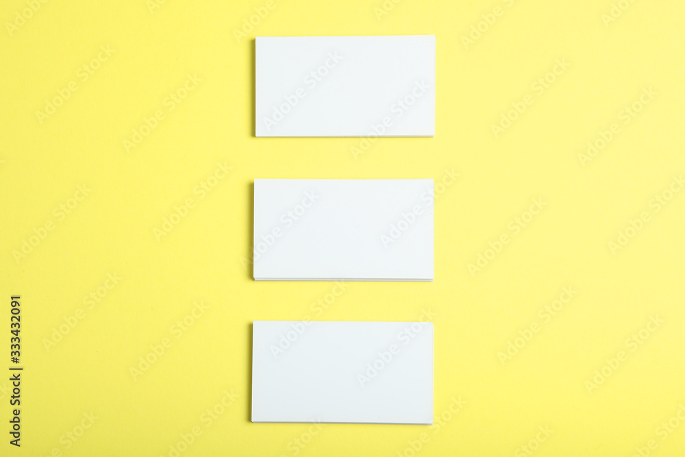 business cards on a colored background top view. Place to insert text business cards on a colored background top view. Place to insert text