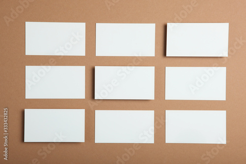 business cards on a colored background top view. Place to insert text