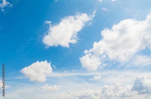 Blue sky with white clouds in the summertime