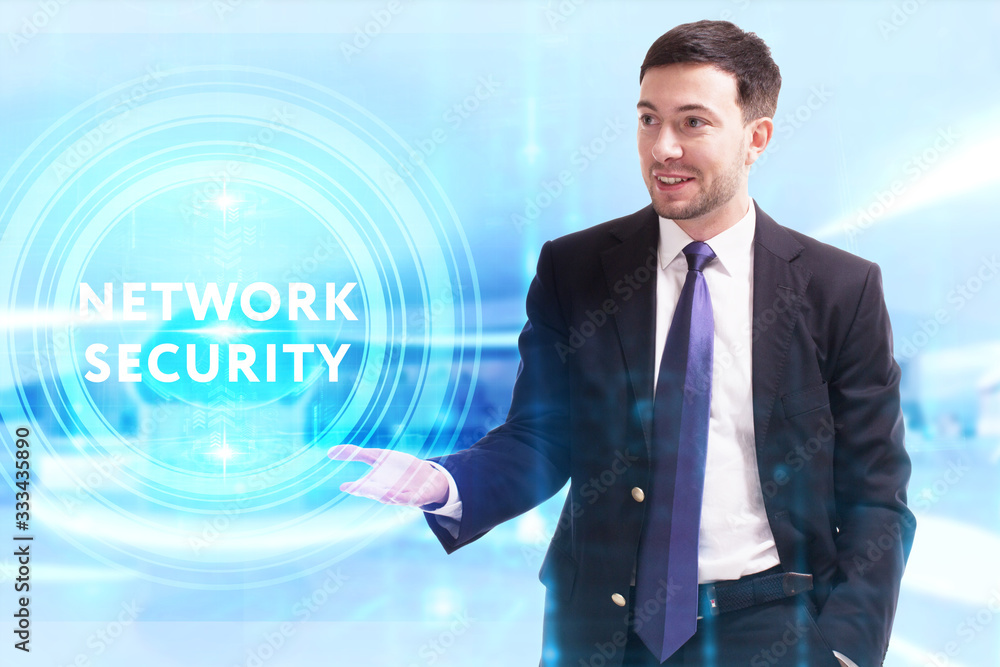 Business, Technology, Internet and network concept. Young businessman working on a virtual screen of the future and sees the inscription: Network security Business, Technology, Internet and network concept. Young businessman working on a virtual screen of the future and sees the inscription: Network security