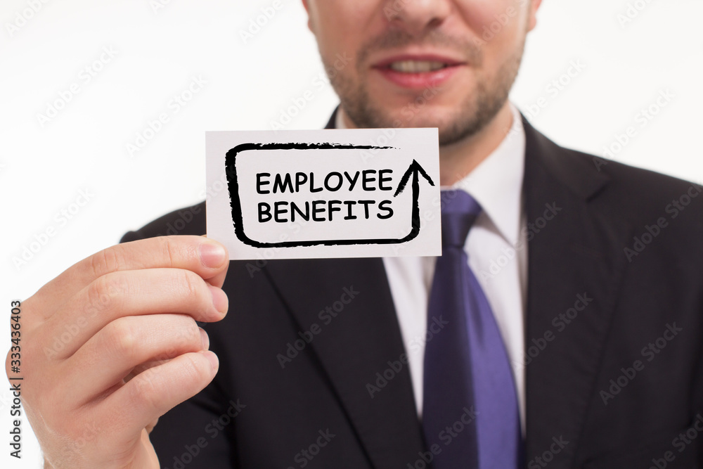 Business, Technology, Internet and network concept. Young businessman working on a virtual screen of the future and sees the inscription: Employee benefits Business, Technology, Internet and network concept. Young businessman working on a virtual screen of the future and sees the inscription: Employee benefits