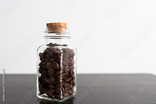 Coffee beans in a transparent jar