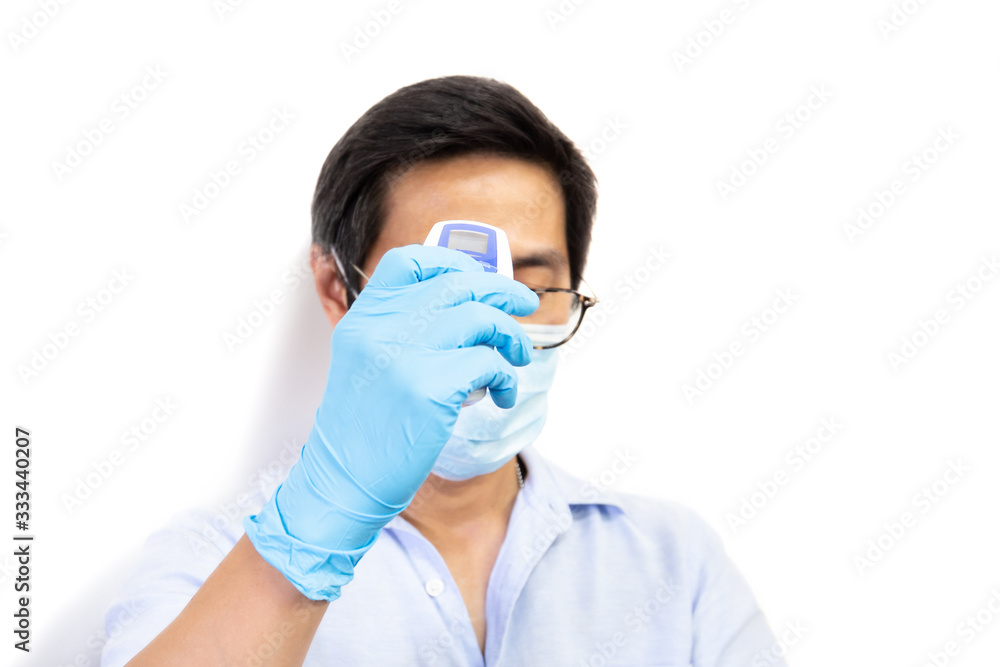 Man using digital thermometer to measures coronavirus symptoms isolated. Man using digital thermometer to measures coronavirus symptoms isolated.