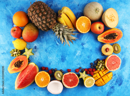 Fototapeta Naklejka Na Ścianę i Meble -  Tropical fruits background, many colorful ripe fresh tropical exotic fruits