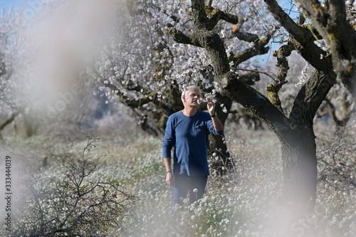 farmer man in an apple field