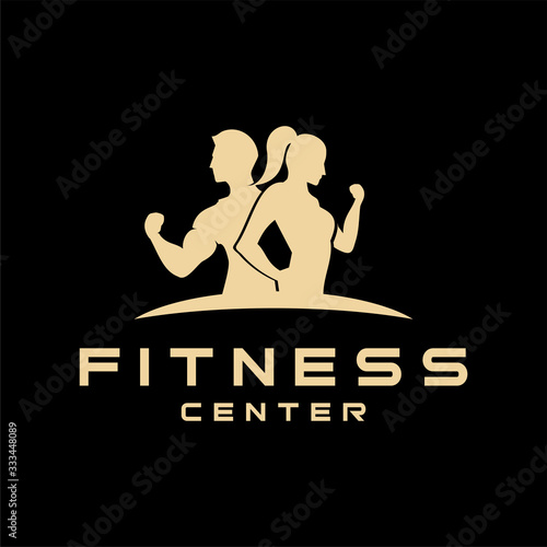 Fitness center logo or emblem with woman and man silhouettes. Woman and Man.