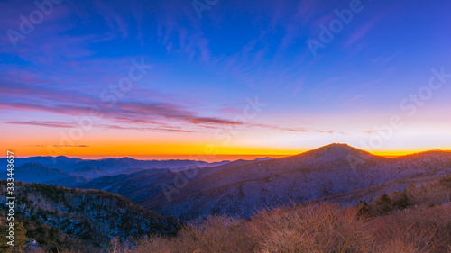 The golden light of a new day Among the cold at Taebaek san Mountain , seoul korea © wutthinan