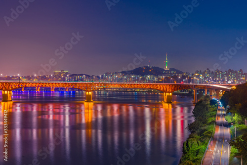 Han River With Seongsu Bridge And Seoul Tower At Night In South Korea.