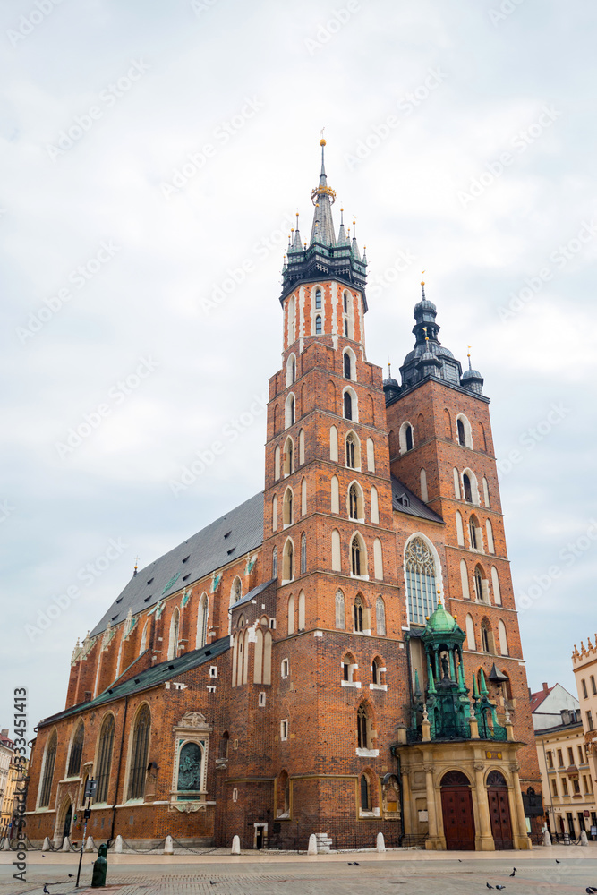 St. Mary's basilica in main square of Krakow. Poland's historic center, a city with ancient architecture. Cracow, Poland. Quarantine in the city.