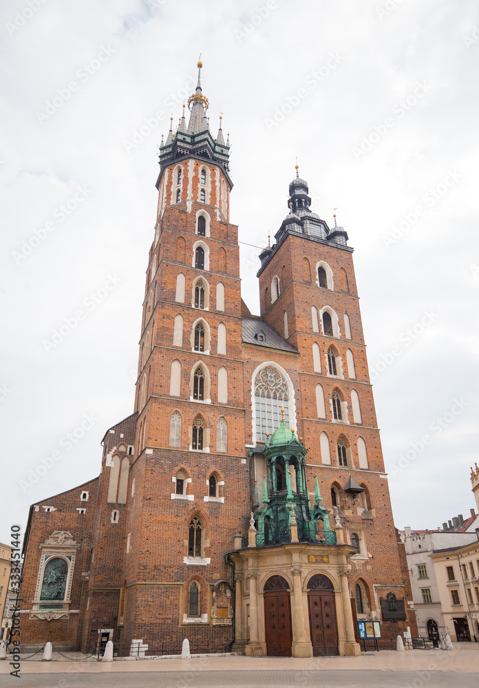 St. Mary's basilica in main square of Krakow. Poland's historic center, a city with ancient architecture. Cracow, Poland. Quarantine in the city.