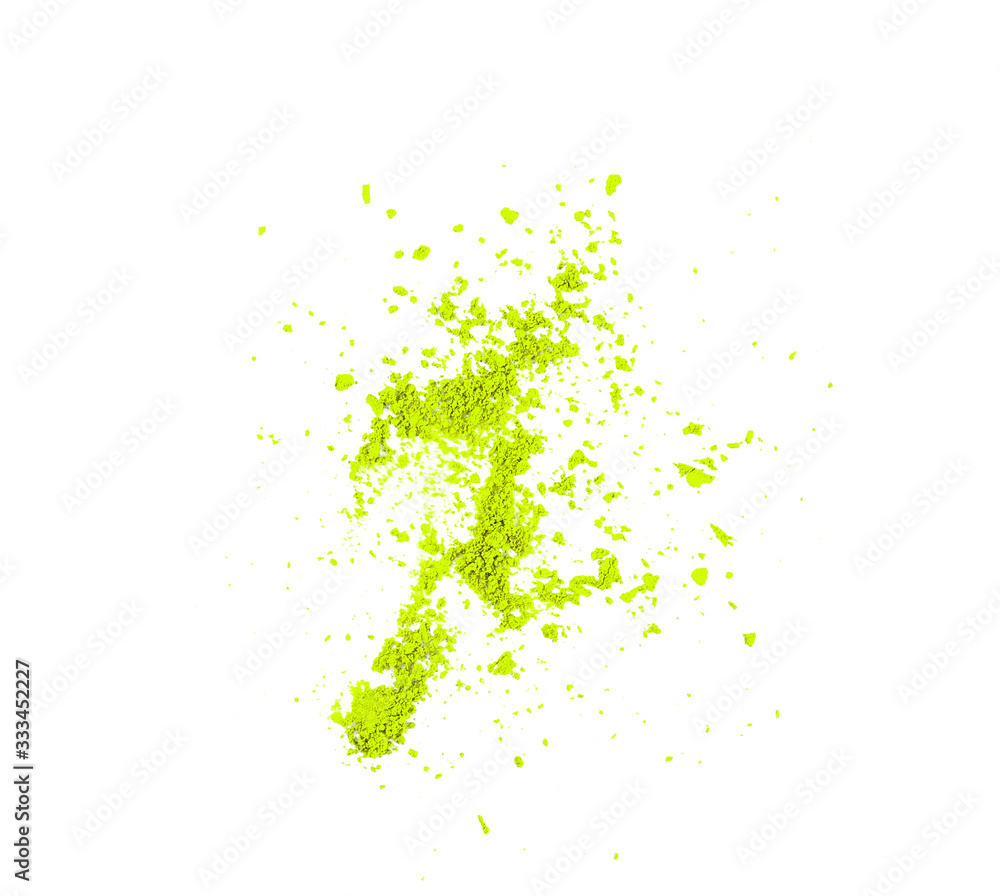 Green tea matcha powder are diffused and diffused. Isolated on a white background. Top view. Green tea matcha powder are diffused and diffused. Isolated on a white background. Top view.