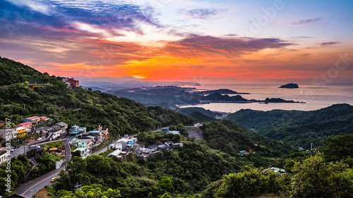 A beautiful sunset with a spectacular red sky in Jioufen, Taiwan. photo