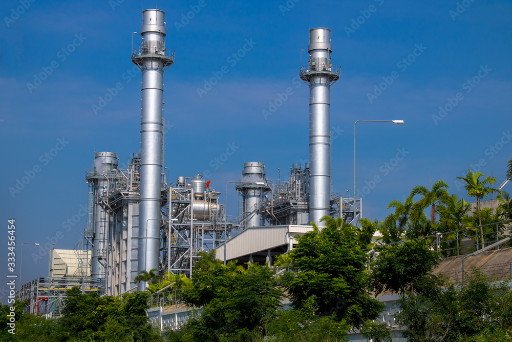 Obraz premium Turbine generator in power plant with blue sky