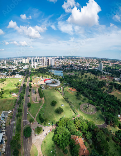 Aerial view of Campo Grande MS, Brazil - Highs of Afonso Pena avenue. Aerial view of a growing city with some buildings and a huge green area. Green city. 