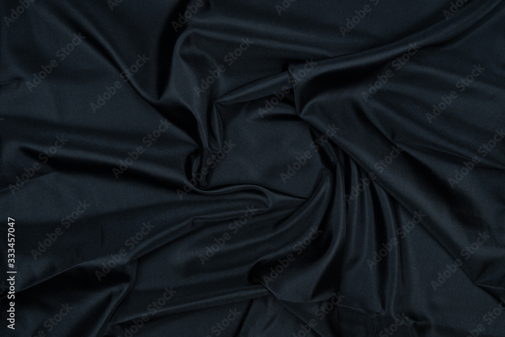 Fototapeta premium Abstract black drapery cloth, Pattern and detail grooved of black fabric for background and abstract