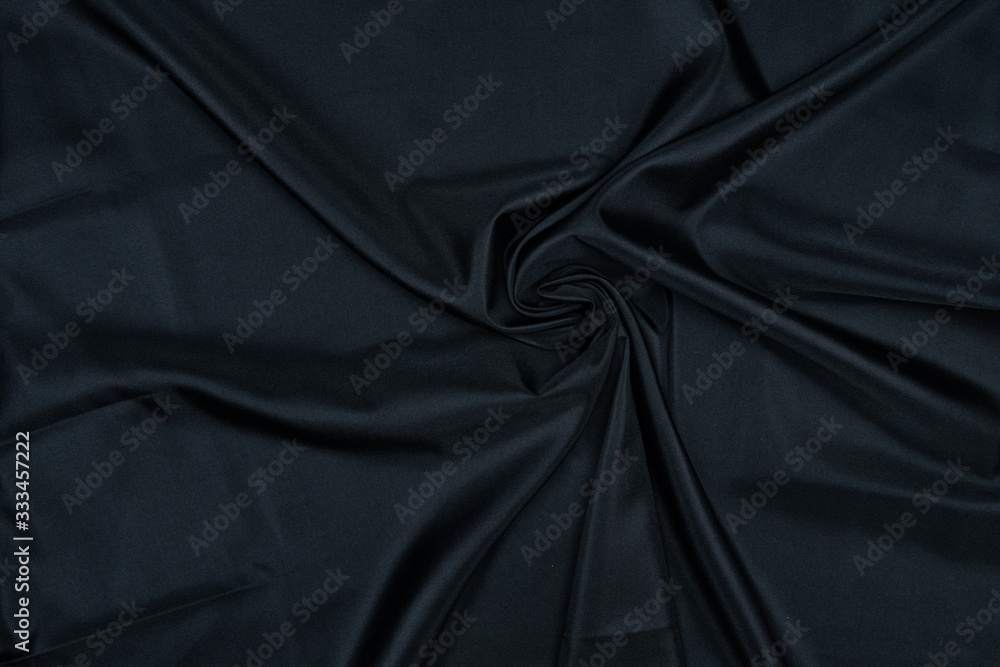 Fototapeta premium Abstract black drapery cloth, Pattern and detail grooved of black fabric for background and abstract