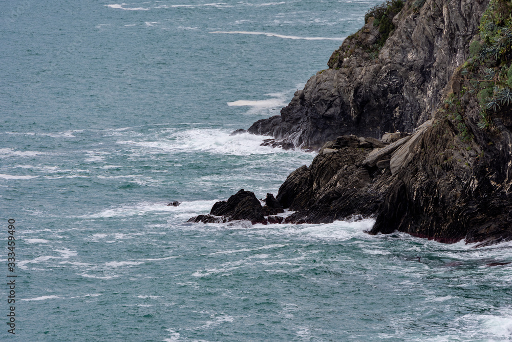 Panoramic view of the Ligurian sea with its rocky headlands overlooking the Cinque Terre Panoramic view of the Ligurian sea with its rocky headlands overlooking the Cinque Terre