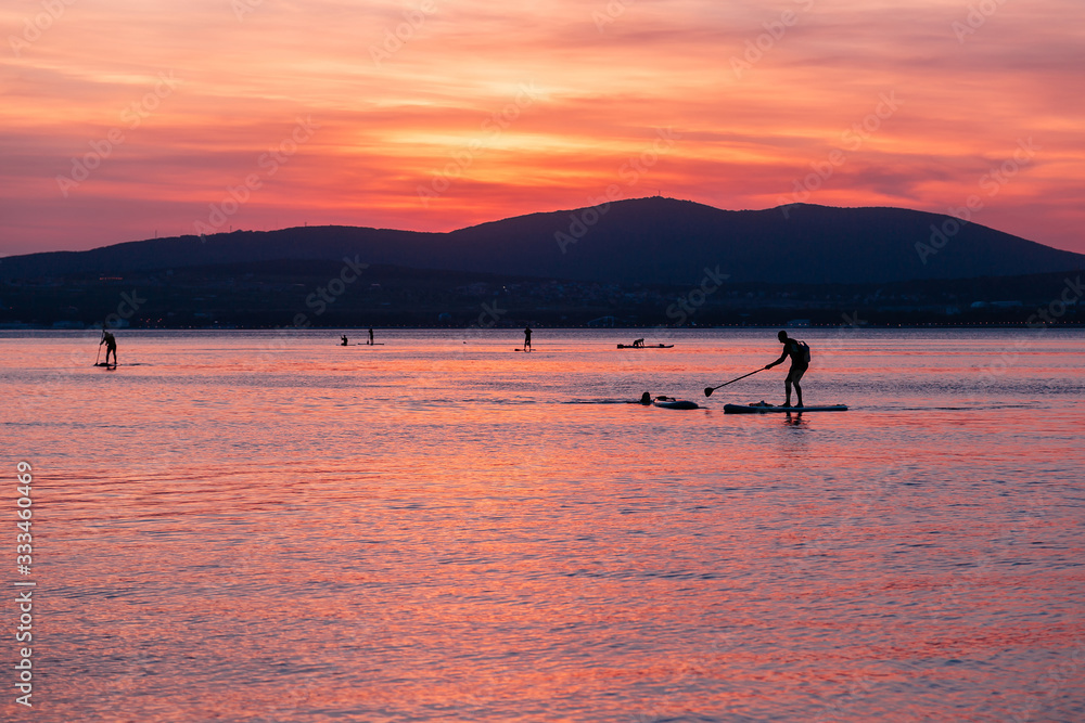 SAP surfing at sunset in Gelendzhik, Krasnodar region.