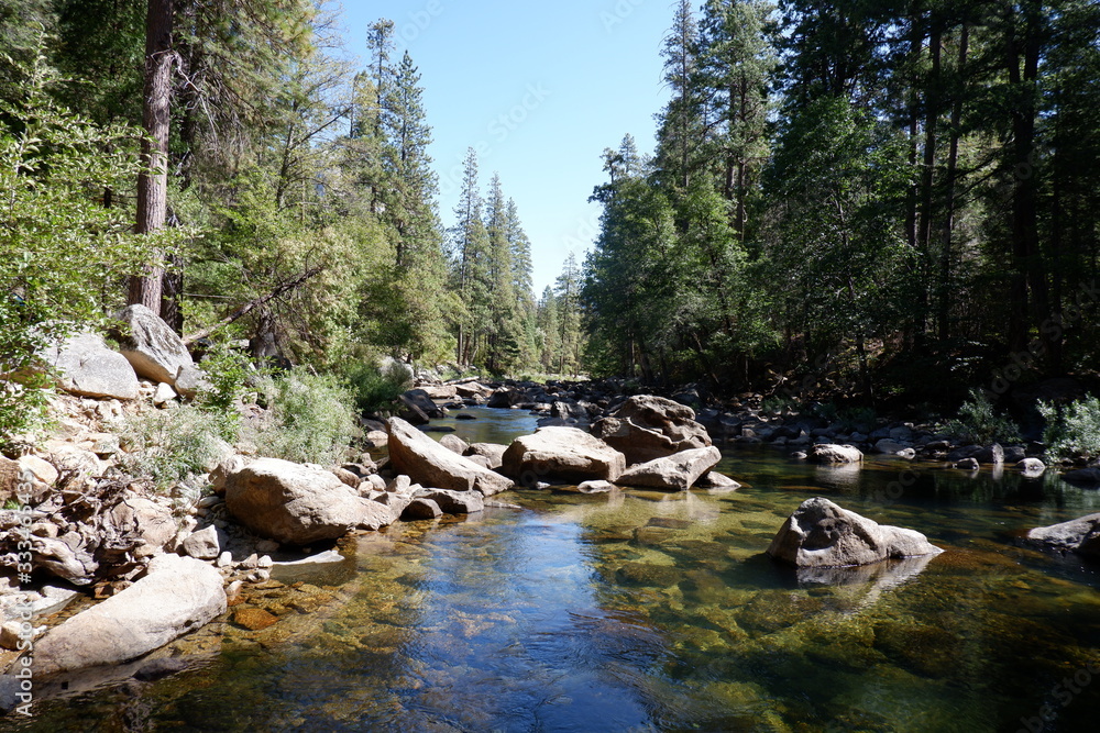 A rocky stream within Yosemite Valley A rocky stream within Yosemite Valley