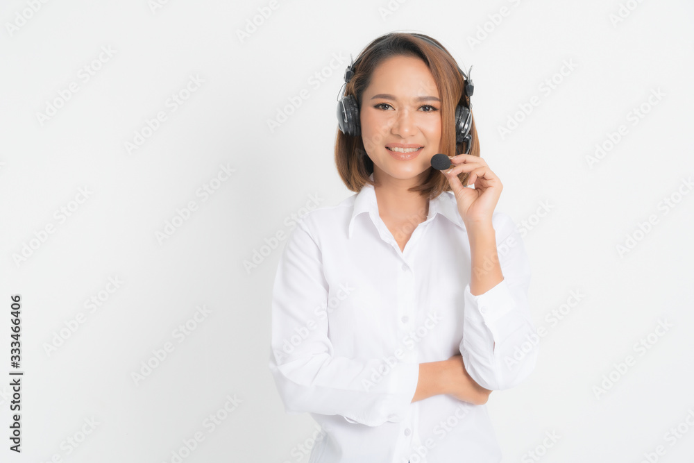 Woman call center with headset holding and credit card Woman call center with headset holding and credit card