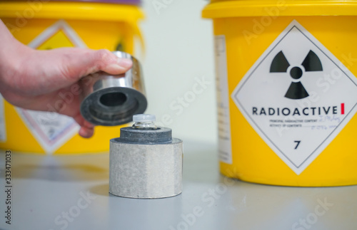 close up hand open lead box of Iodine 131(I-131)Radioactive isotopes used for hyperthyroidism treatment.