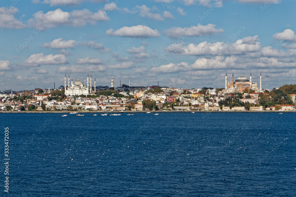 The Suleymaniye Mosque and Hagia Sophia Museum dominate the crowded skyline of Istanbul on the shores of the Sea of Marmara.