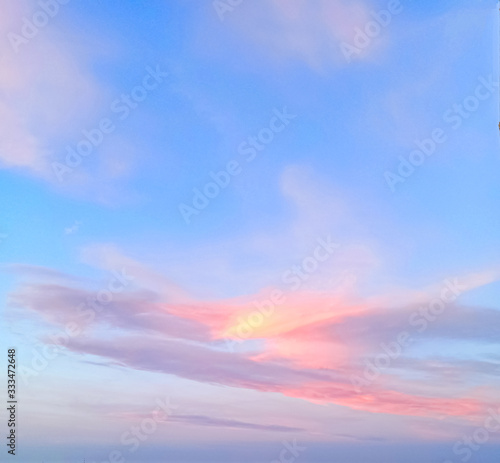 Gentle sky with fantastic pink-lilac clouds.