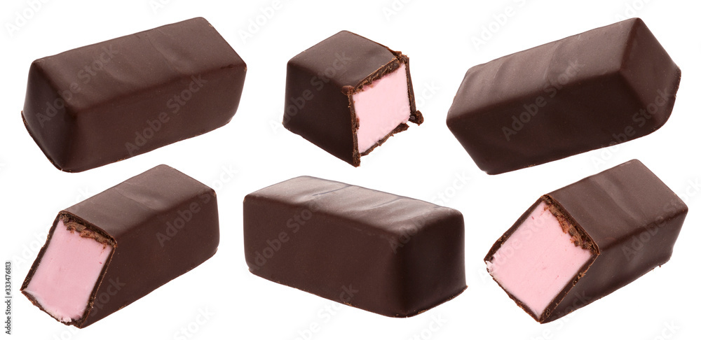 Chocolate candies with milk strawberry souffle isolated on white background Chocolate candies with milk strawberry souffle isolated on white background