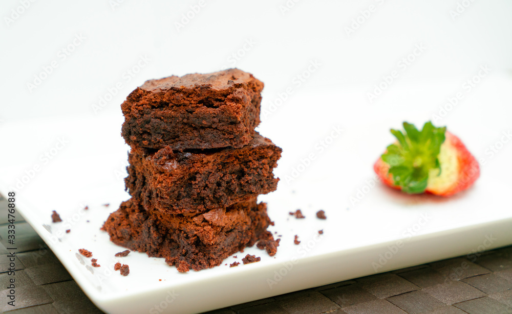 brownie with strawberry on the white background