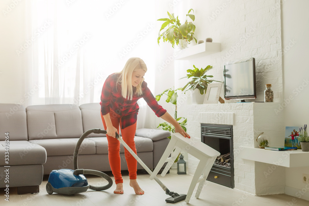 woman cleans the floor of the house woman cleans the floor of the house