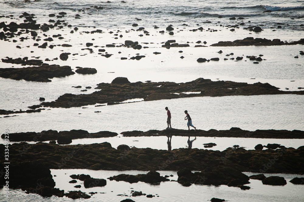 Person walking on the beach in morocco