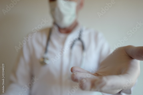 médecin gants masque signe "donnez"