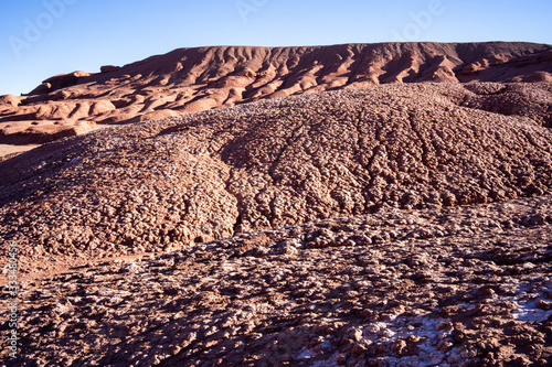 The landscape of a completely red plain in the Puna Salteña photo