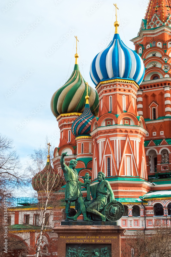 Fototapeta premium Moscow, Russia- March 16, 2020: Monument to Minin and Pozharsky on Red Square on the background of St. Basil's Cathedral