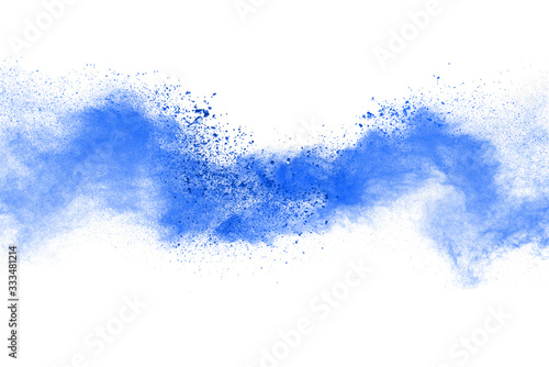Blue powder explosion on white black background.