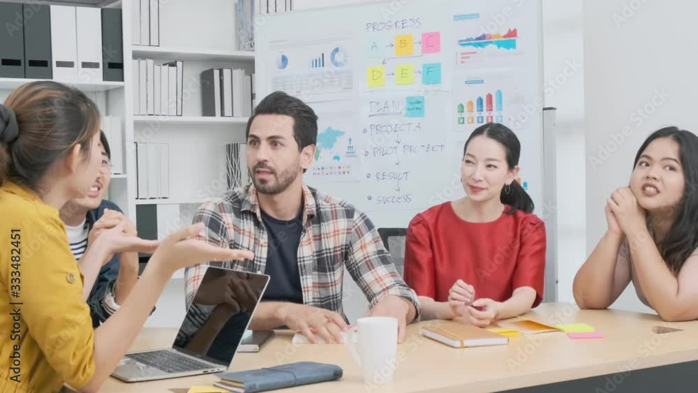 4k uhd slow motion of Group of asian and caucasian young creative happy enjoy laugh smile and great success emotion teamwork people business startup entrepreneur casual brainstorm business meeting off 4k uhd slow motion of Group of asian and caucasian young creative happy enjoy laugh smile and great success emotion teamwork people business startup entrepreneur casual brainstorm business meeting off