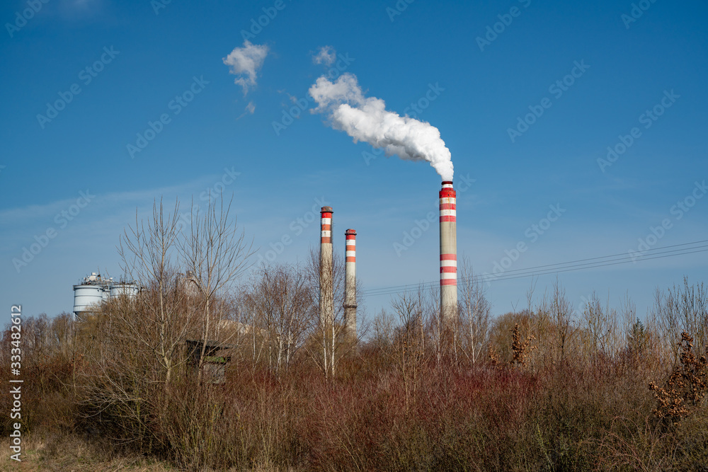power plant chimney producing the smoke