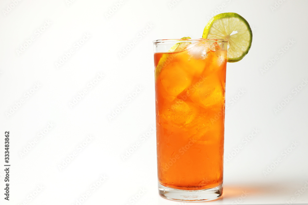 Iced tea lemon juice fresh drink on white bakcground, Isolate black tea and lime lemon in the glass cocktail drink. Iced tea lemon juice fresh drink on white bakcground, Isolate black tea and lime lemon in the glass cocktail drink.
